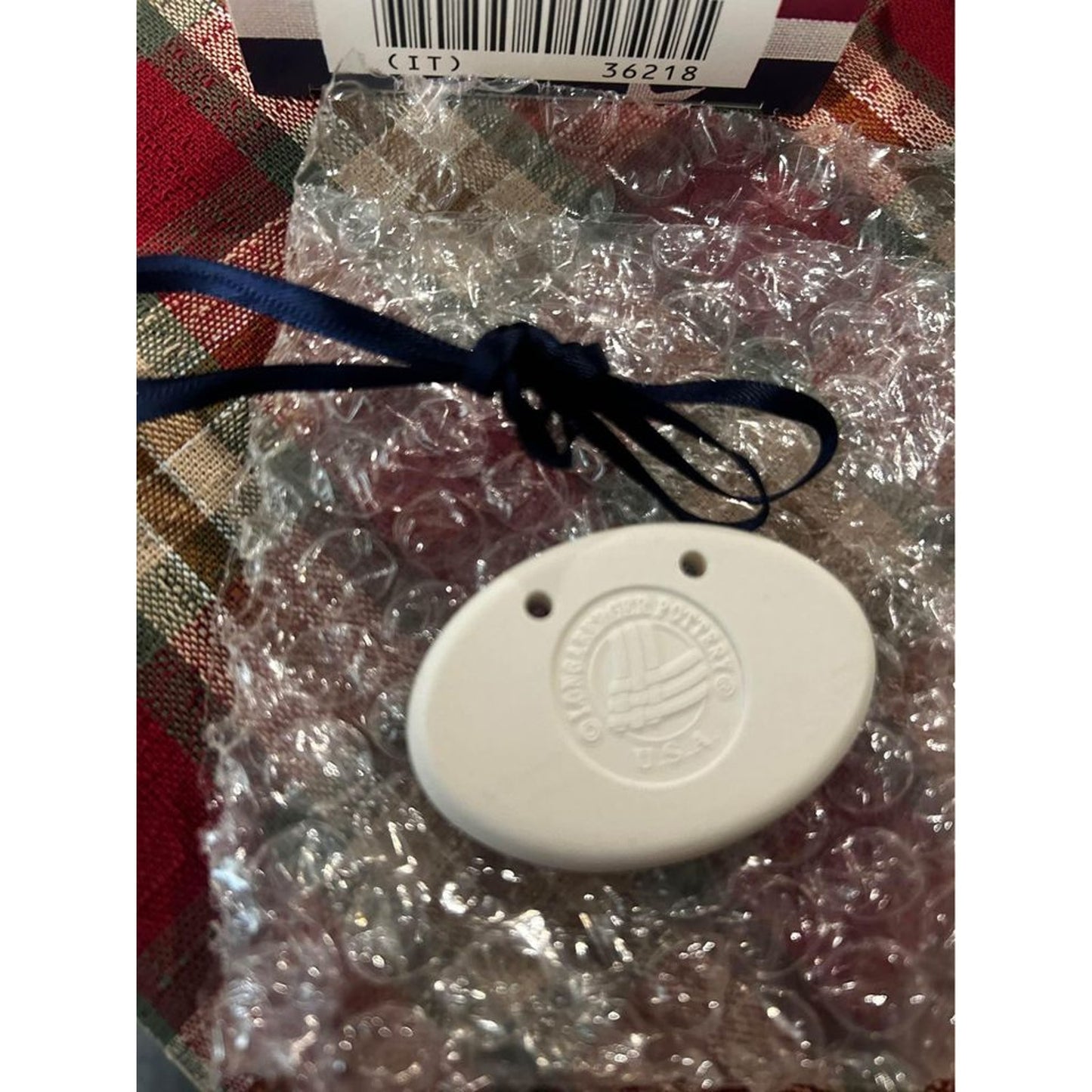 Longaberger basket tie on Oval flag pottery USA